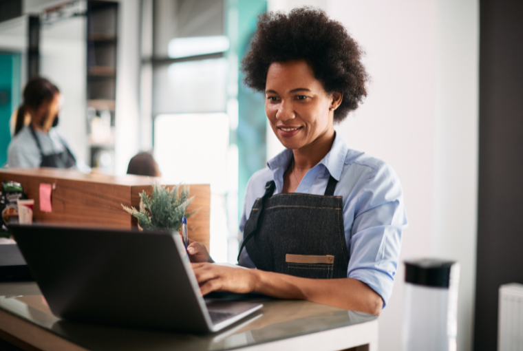 A salon owner considers different salon payment processing solutions for her business